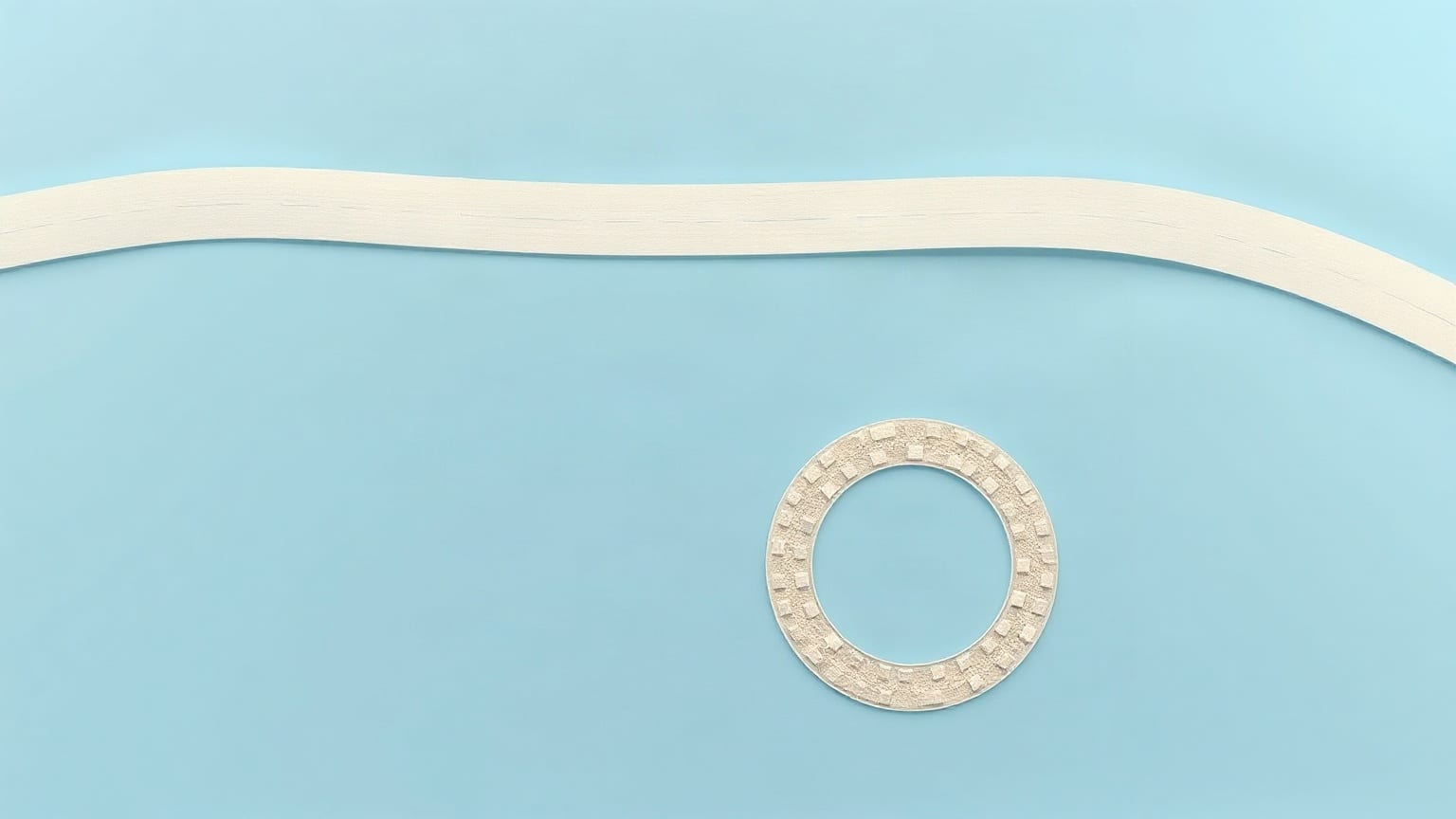A pale road band curving across the top of the frame and a separate ring of small cream blocks below it, on pale blue